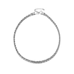 Our stunning Twiggy Necklace is an exquisite blend of elegance and edge. Crafted with precision, this eye-catching accessory features a unique intertwining design th